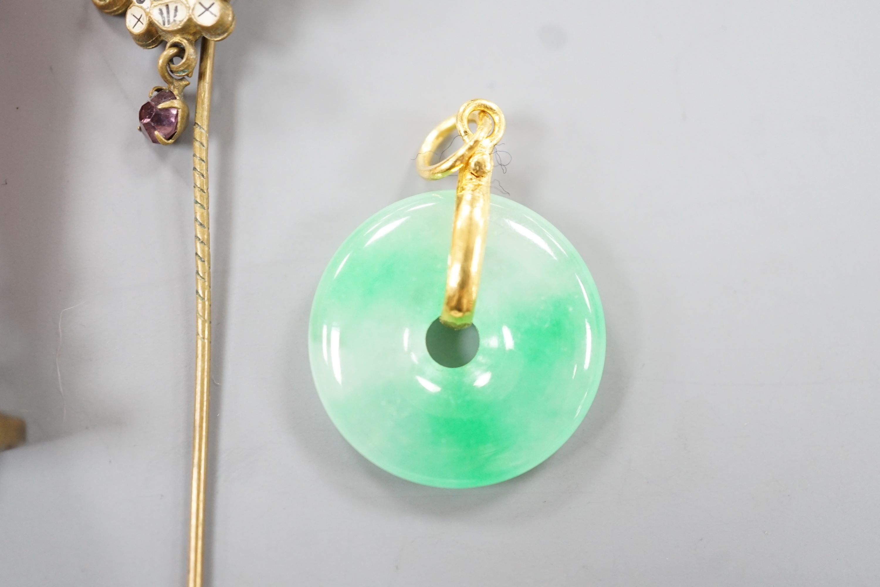 An 18k mounted jade set teardrop shaped pendant, 36mm and three other items of jewellery, including a seal and stick pin.